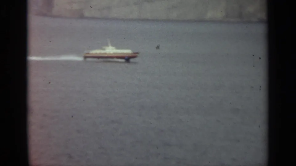 The 1965 Stockholm home-movie footage follows the hydrofoil as it skims across calm water.