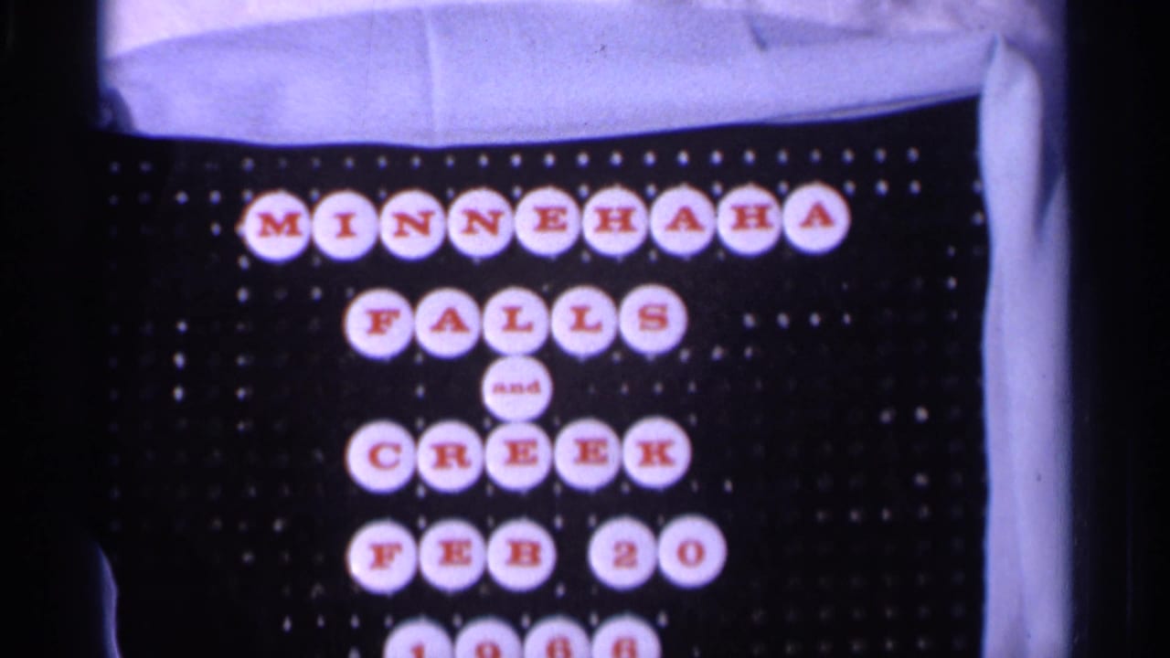 1966 8mm title card for Minnehaha Falls and Creek, arranged with red letters on white circles against a black backing.
