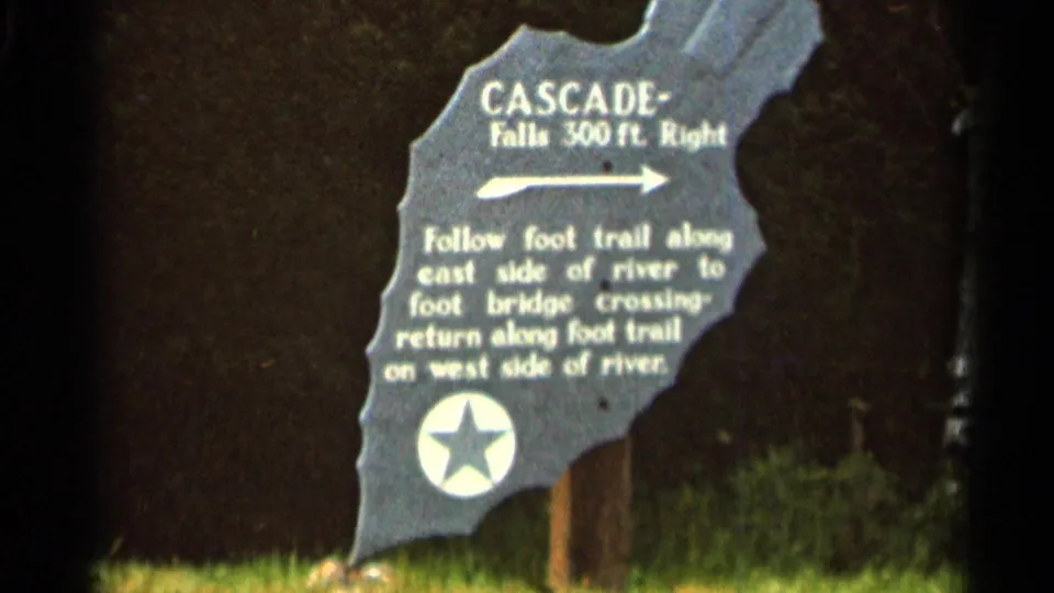 1966 Hamel, Minnesota frame showing a shaped Cascade Falls sign noting falls 300 feet to the right and a foot trail route.
