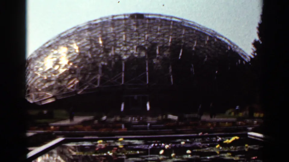 1966 Saint Louis visitor footage shows a large geodesic dome-like structure with water and plantings in the foreground.