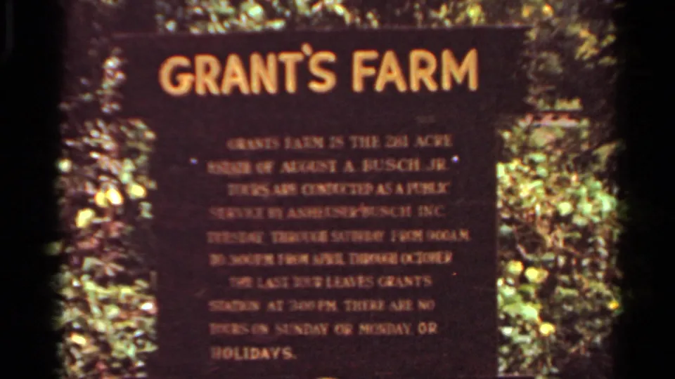 Close view of a Grant's Farm sign in St. Louis, confirming the location within the 1966 8mm home movie.