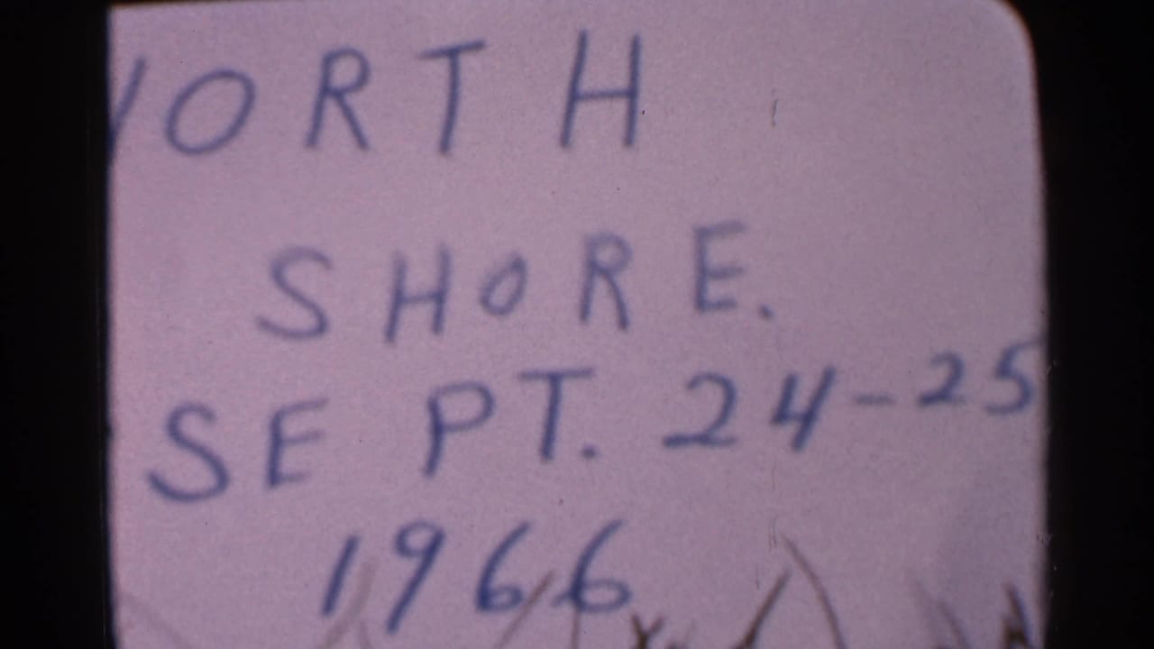 Handwritten title card reading North Shore and 1966 on 8mm film.