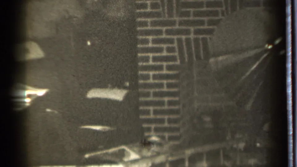 Soft 8mm frame of a Danielson home interior, with brick fireplace detail and low indoor exposure.