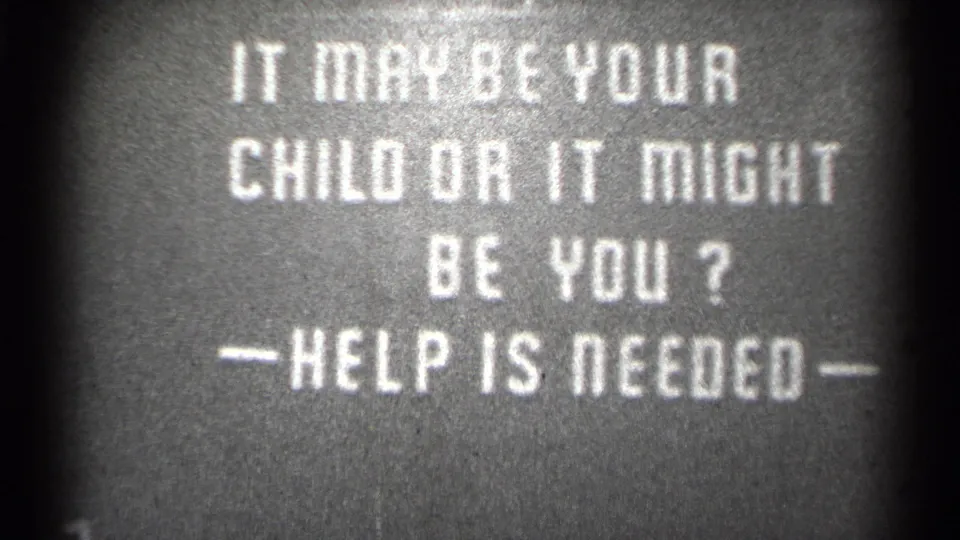 Metadata-dated 1944 black-and-white 8mm frame showing a child-related help appeal in white block letters.