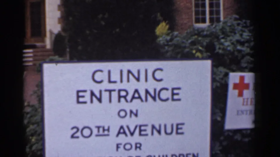 Final frame centers the San Francisco clinic entrance sign, with 20th Avenue text and a partial Red Cross-style marker visible nearby.