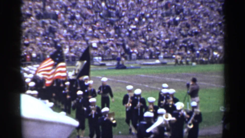 The final frame shows flag bearers and uniformed band members near the field edge, with crowded stands in the San Francisco stadium background.