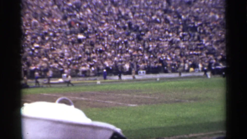 1944 San Francisco stadium view with a large crowd in the bleachers and part of the field visible from a spectator position.