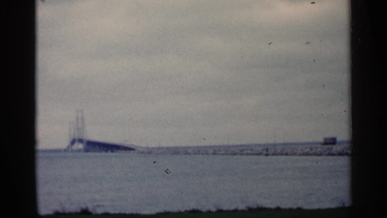 Bridge over water seen from a slightly closer distant view.