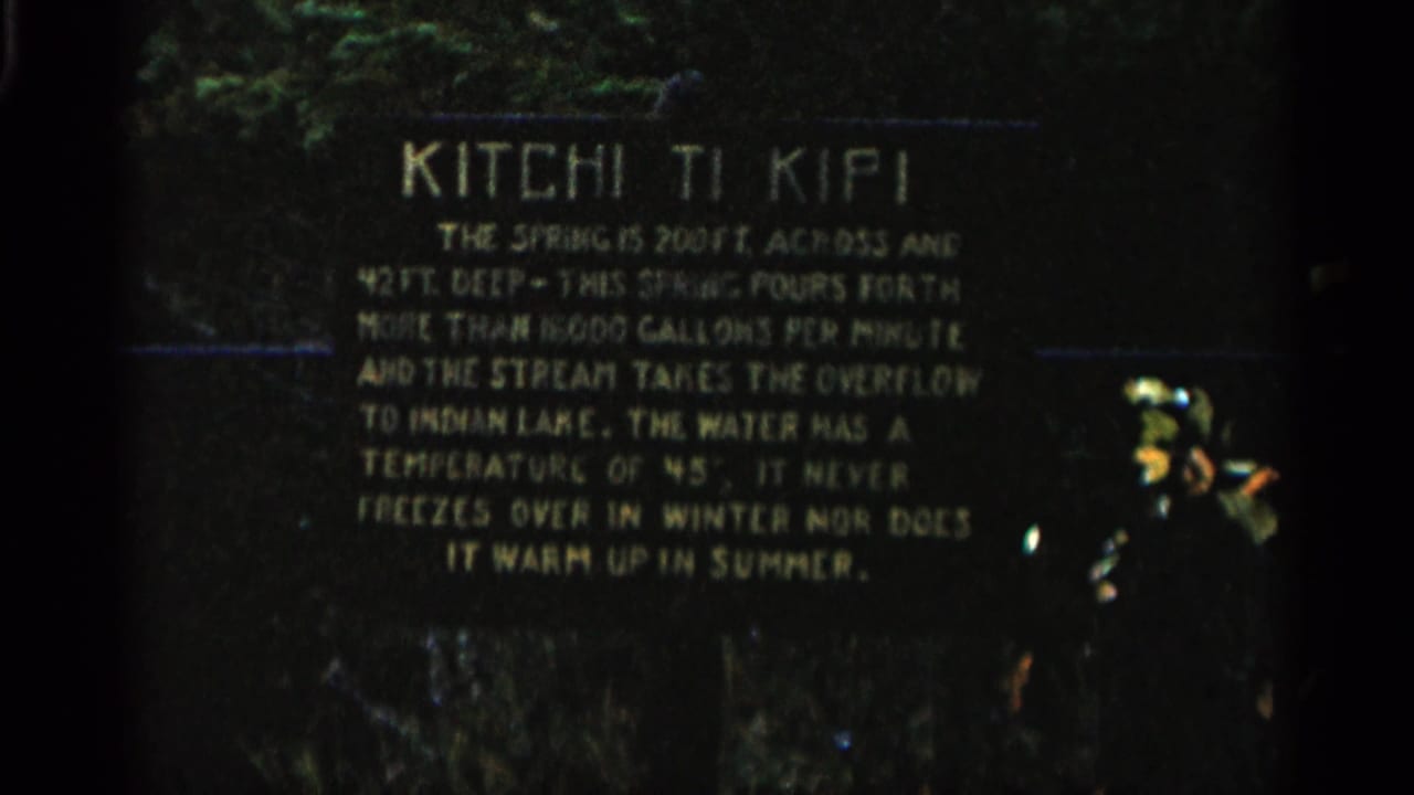 Kitchi Ti Kipi sign with text about spring size, depth, flow, and water temperature.