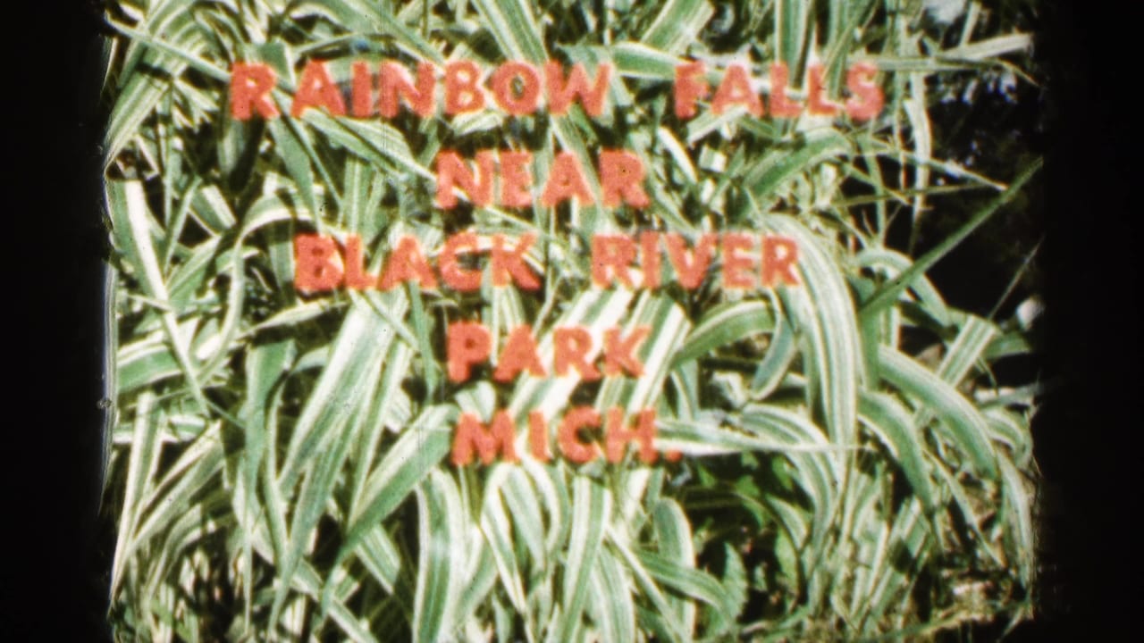Second title-card frame with red lettering over leafy foliage.