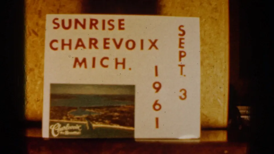 The Charlevoix, Michigan date card remains in view, showing Sunrise, Sept. 3, 1961, and a small printed waterfront mark.