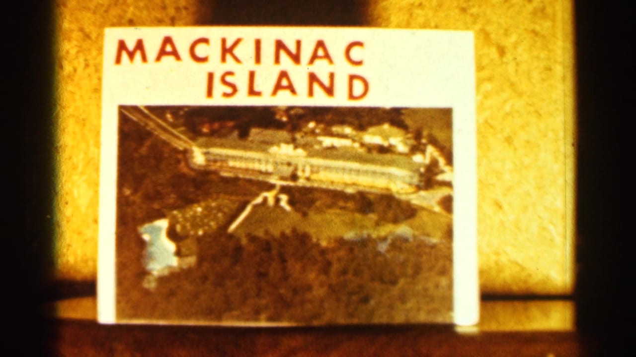 Mackinac Island postcard propped indoors.