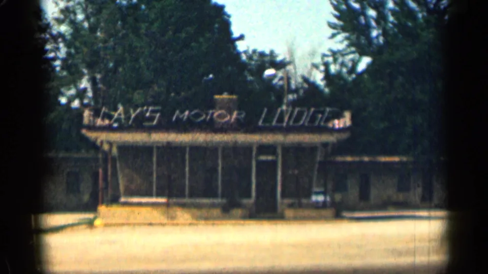 A wider 1963 Texas view shows Lay's Motor Lodge, its sign, front glazing, entrance, and open parking area.