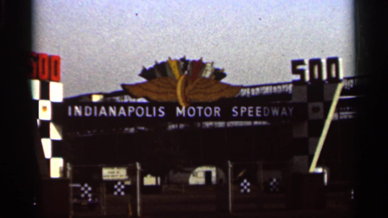 Indianapolis Motor Speedway entrance with winged emblem and large 500 signs.