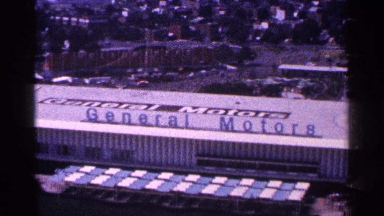 Elevated view of the General Motors pavilion roof and surrounding fairground.