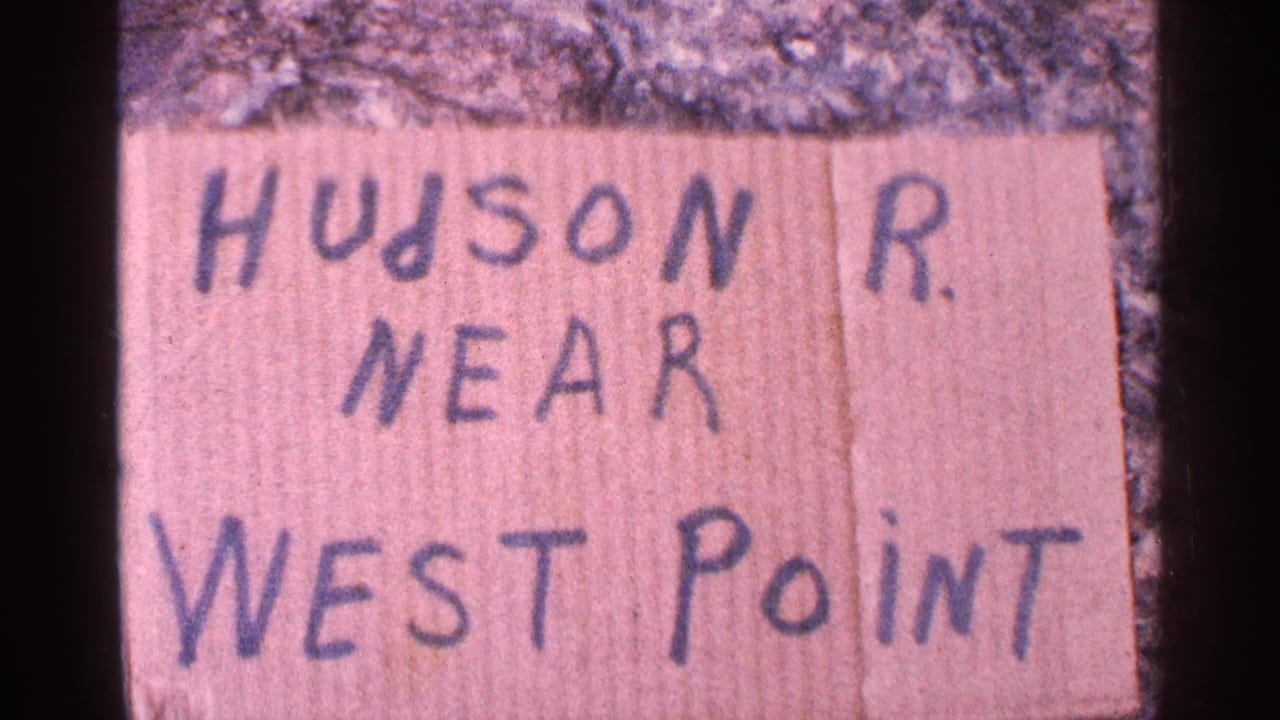 Handwritten cardboard sign reading HUDSON R. NEAR WEST POINT.