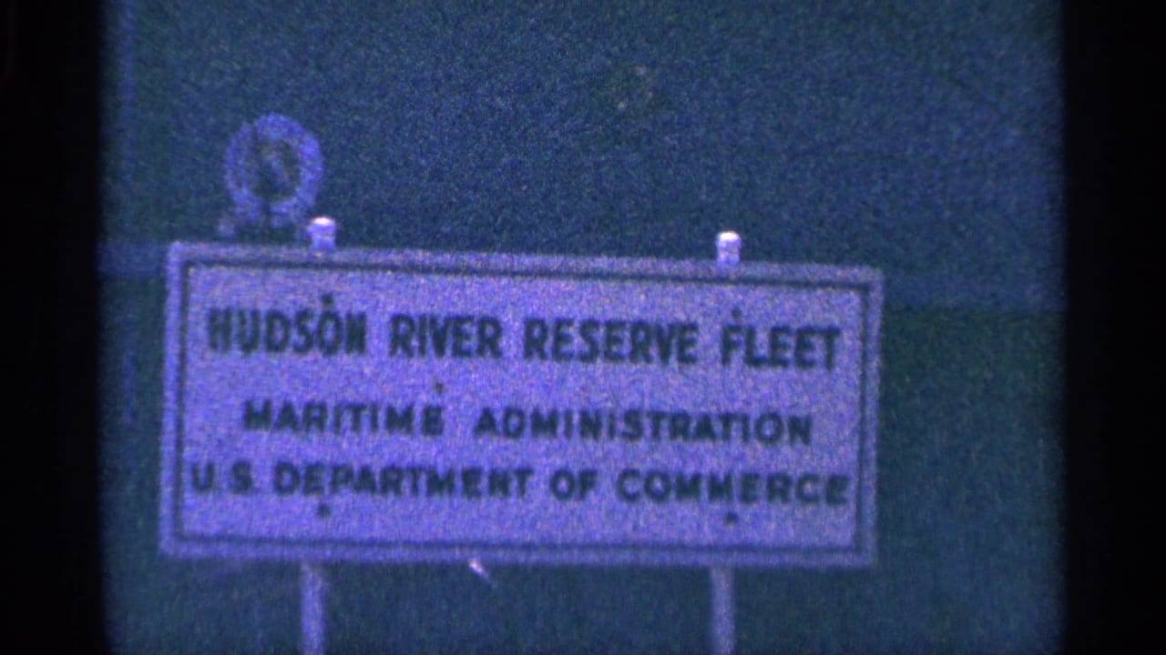 1964 8mm frame showing a Hudson River Reserve Fleet sign for the Maritime Administration, U.S. Department of Commerce.
