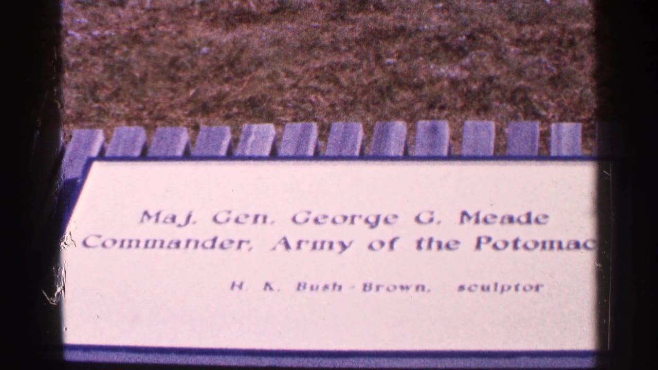 Plaque text for Maj. Gen. George G. Meade, partly framed by dark film edges.