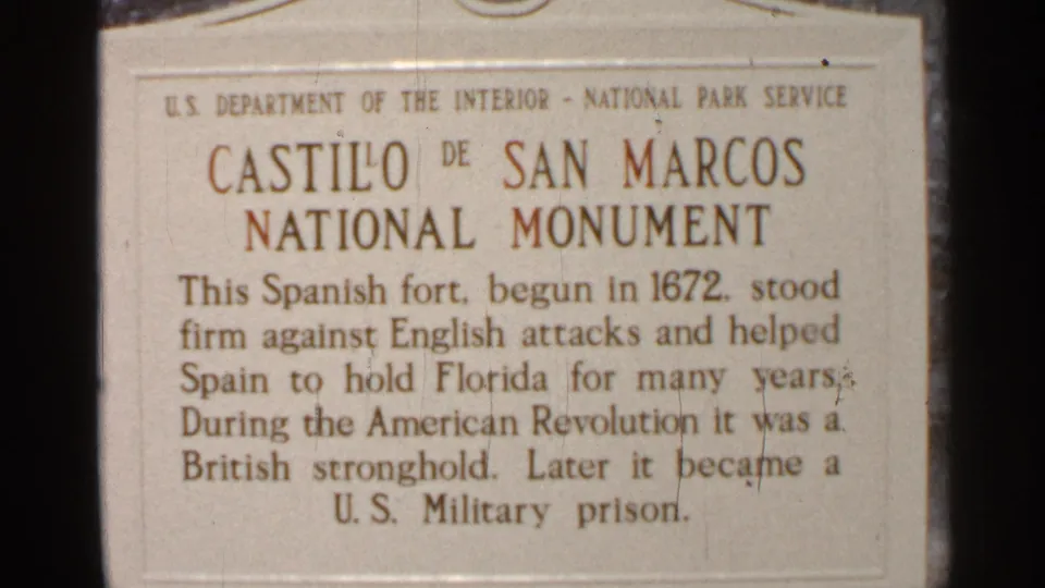 Close view of a Castillo de San Marcos National Monument plaque during a 1966 Florida home-movie visit.