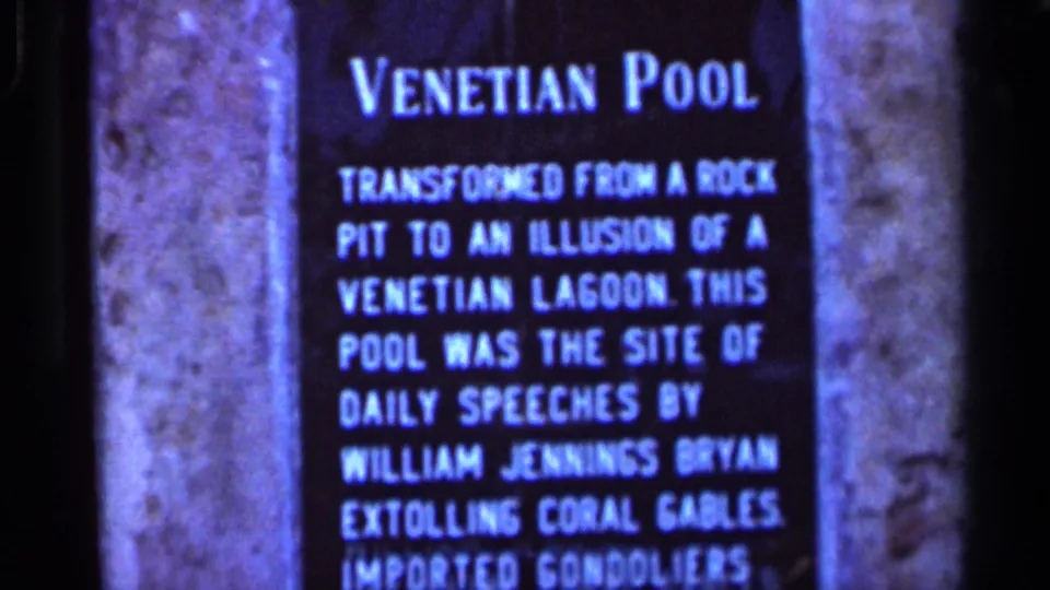 1966 Florida close-up of the Venetian Pool sign, with text about a former rock pit and William Jennings Bryan speeches.