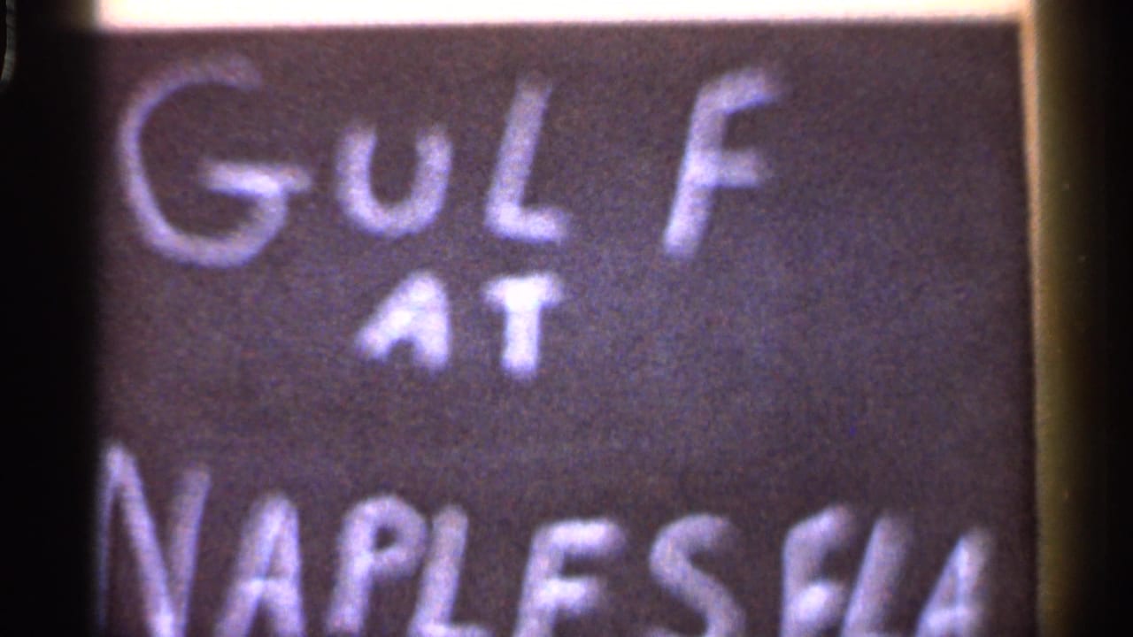 Second close frame of the same golf sign with "GOLF AT" and partial Naples lettering visible.