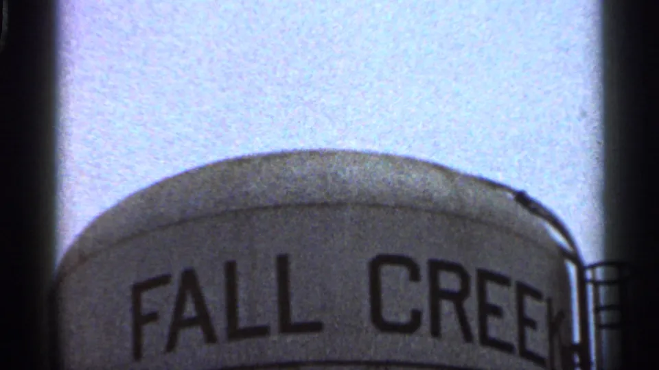 1966 Georgia 8mm frame with the water tower top and bold FALL CREEK lettering cropped along the lower edge.