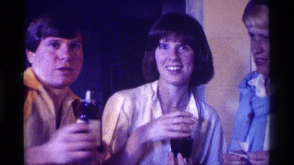 The party scene shows the man with a microphone, a woman holding a drink, and another woman partly visible in a private interior.