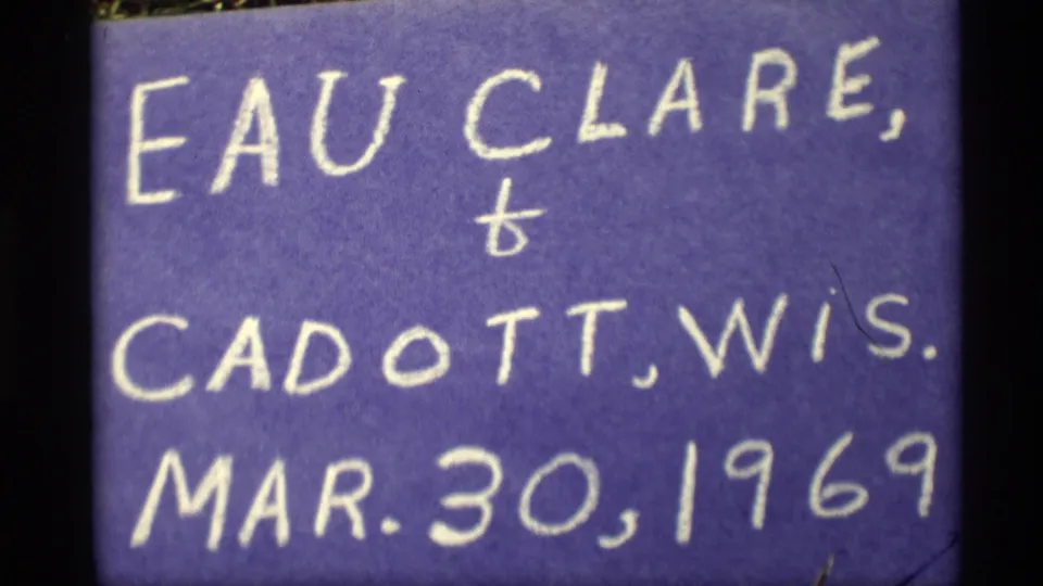 Purple handwritten title card appears to read Eau Claire and Cadott, Wis., Mar. 30, 1969, providing reel context that differs from supplied clip metadata.