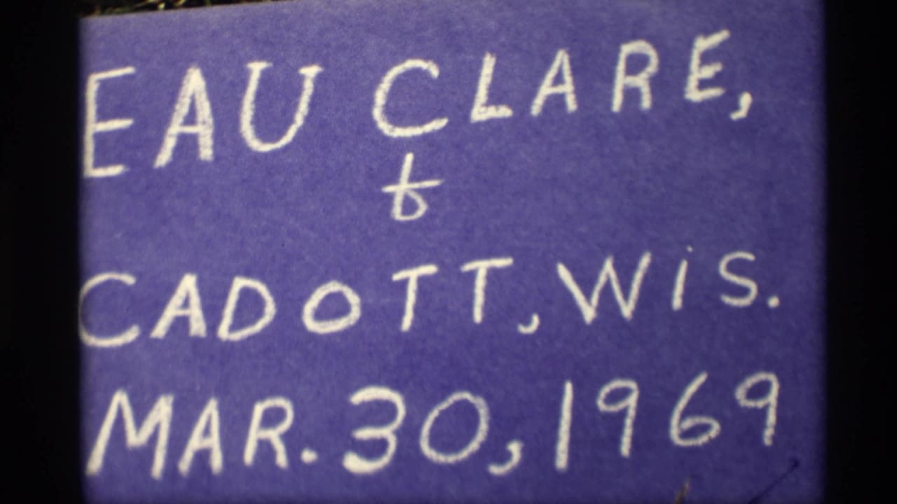 A repeated handwritten card names Eau Claire and Cadott, Wisconsin, and shows March 30, 1969 on purple film stock.
