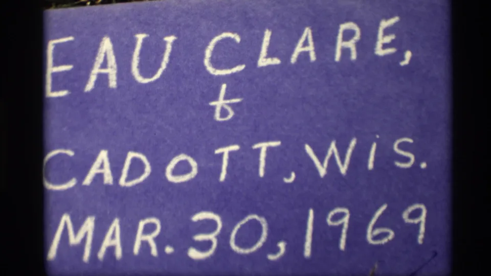 A repeated handwritten card names Eau Claire and Cadott, Wisconsin, and shows March 30, 1969 on purple film stock.