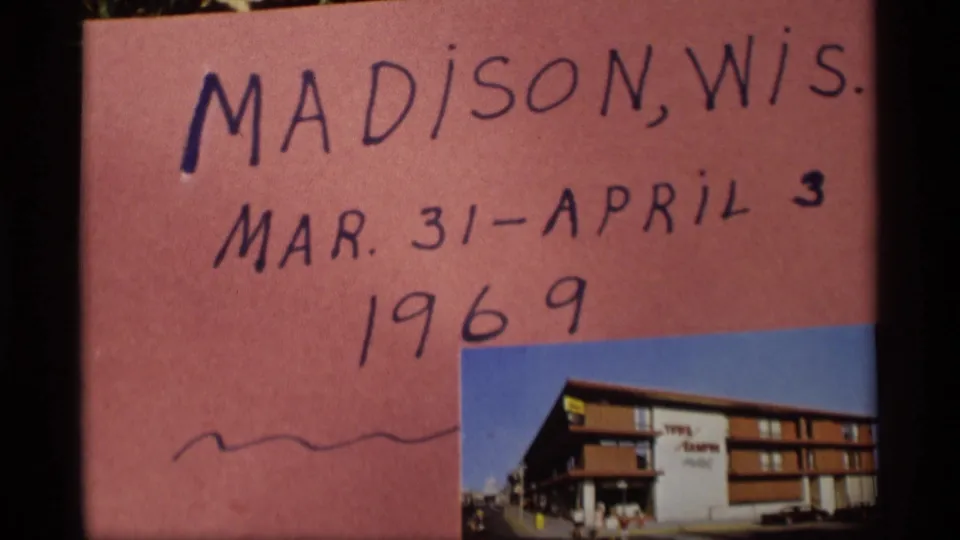 The title card fills the frame, showing Madison, Wis., March 31-April 3, and 1969 above a small building photograph.