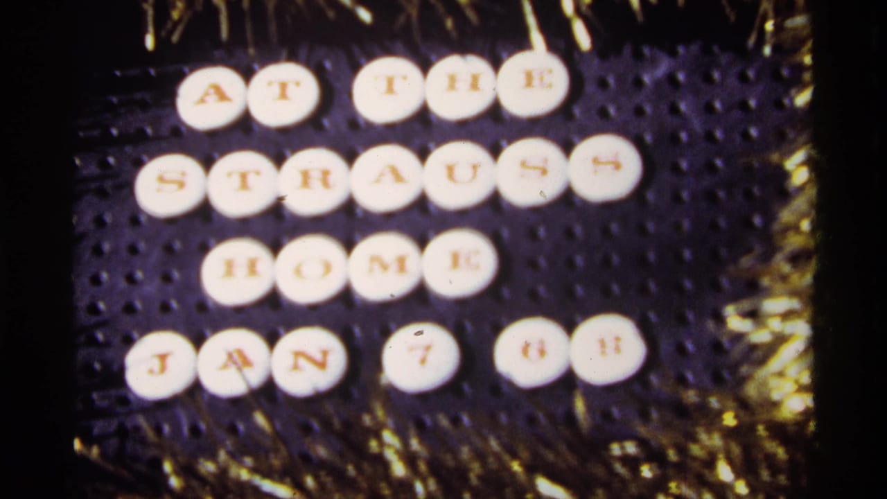 Pegboard-style title card reading At The Strauss Home Jan 7 68.