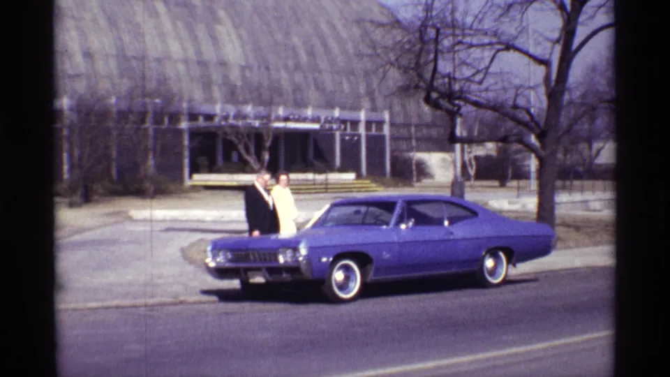 The final frame shows the formal couple beside the purple coupe outside Garfield Park Conservatory in supplied 1968 Chicago metadata.