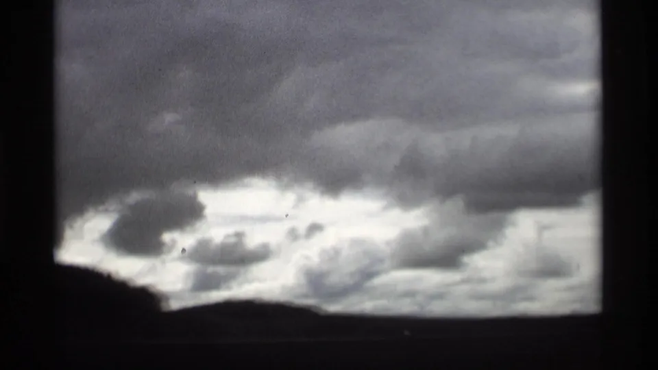 Overcast sky and dark horizon from the Holland, Michigan trip reel, used as a moody weather cutaway.