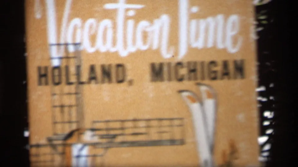Title card for the Holland, Michigan footage, with Vacation Time lettering and simple illustrated travel motifs.