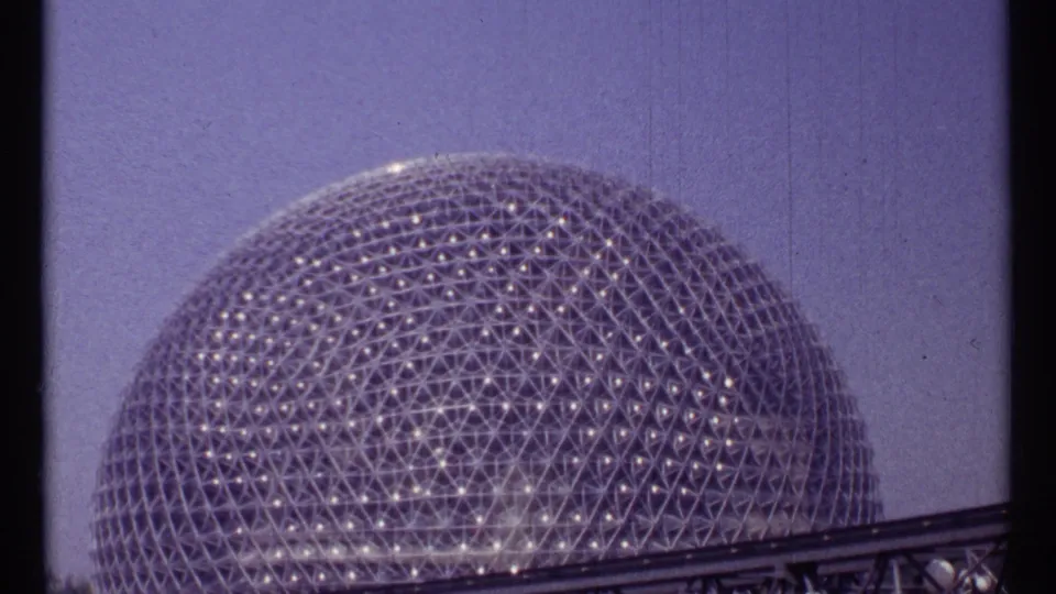 A closer 1967 Montreal view shows the geodesic dome's repeating lattice above a low foreground railing.