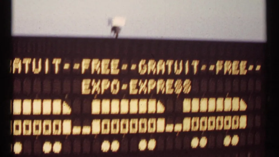 Expo 67 transit sign with illuminated French-English text reading FREE, GRATUIT, and EXPO EXPRESS.