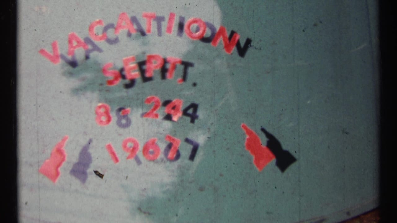 Vacation Sept. 8-24 1967 lettering centered on a teal surface.
