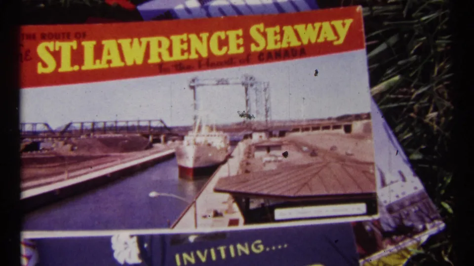 1967 Ottawa frame showing overlapping Canadian travel brochures, led by a St. Lawrence Seaway cover on grass.