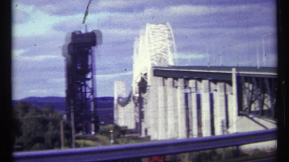 A ride-like structure, booth area, and railing appear in the background of the Ottawa 1967 toll-booth scene.