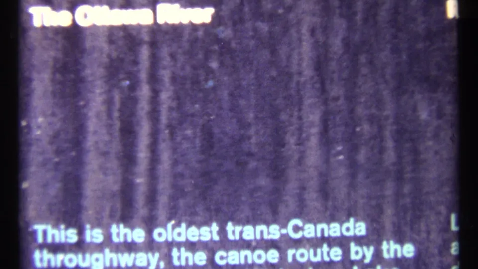 1967 Ottawa home-movie title card reading The Ottawa River, with text about a trans-Canada canoe route partly visible below.