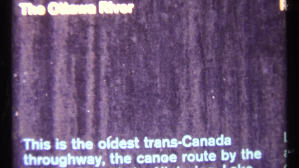Ottawa River title card on 8mm film, with lower text describing the river as an old trans-Canada canoe route.