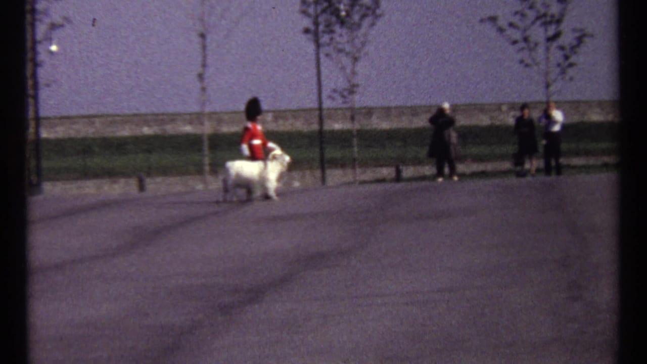 In Ottawa 1967 footage, a red-uniformed guard appears with a white ceremonial goat as spectators watch from beside a low wall.