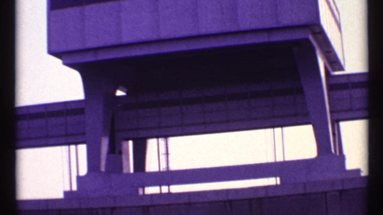 1967 Toronto 8mm close-up of an elevated concrete structure with vertical supports, beams, and shadowed underside.