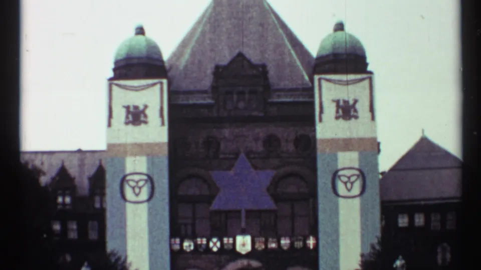 Toronto Old City Hall in 1967, seen with green domes, hanging banners, and a large Star of David on the facade.