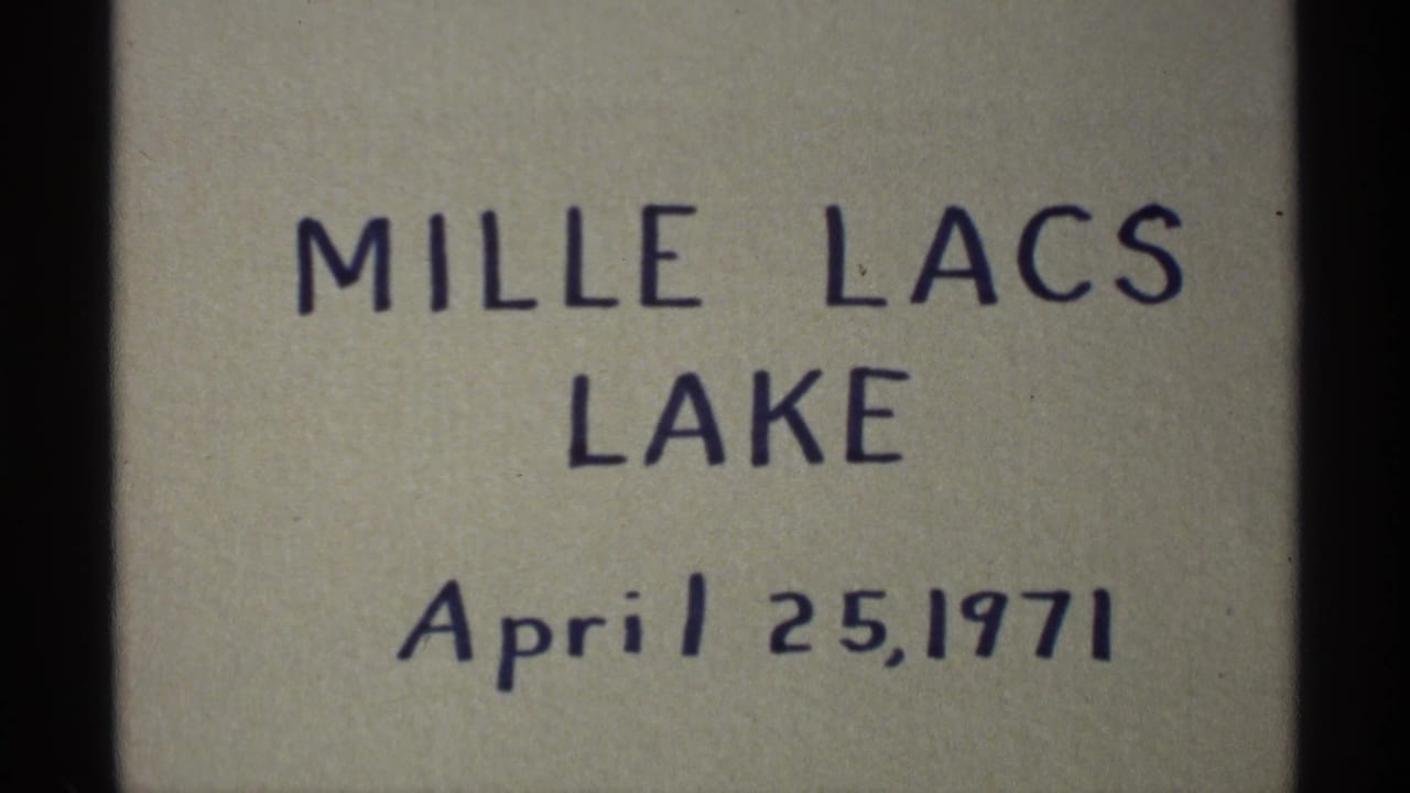 Handwritten 8mm title card identifies Mille Lacs Lake and April 25, 1971, supporting the Minnesota lakeside setting.