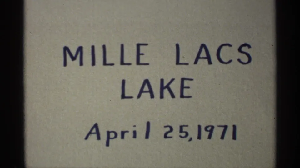 Handwritten 8mm title card identifies Mille Lacs Lake and April 25, 1971, supporting the Minnesota lakeside setting.