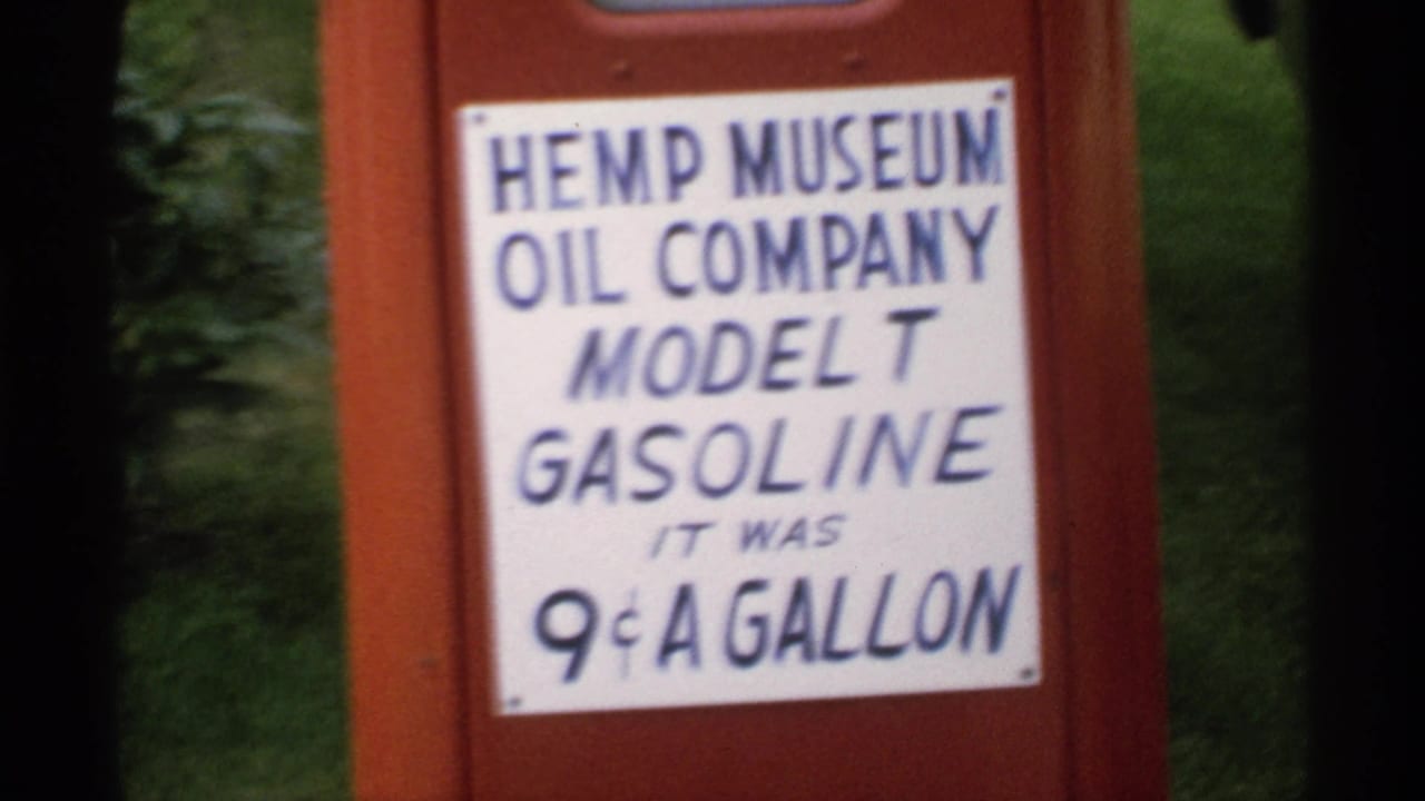 Red gas pump sign reading Hemp Museum Oil Company Model T Gasoline, 9 cents a gallon.