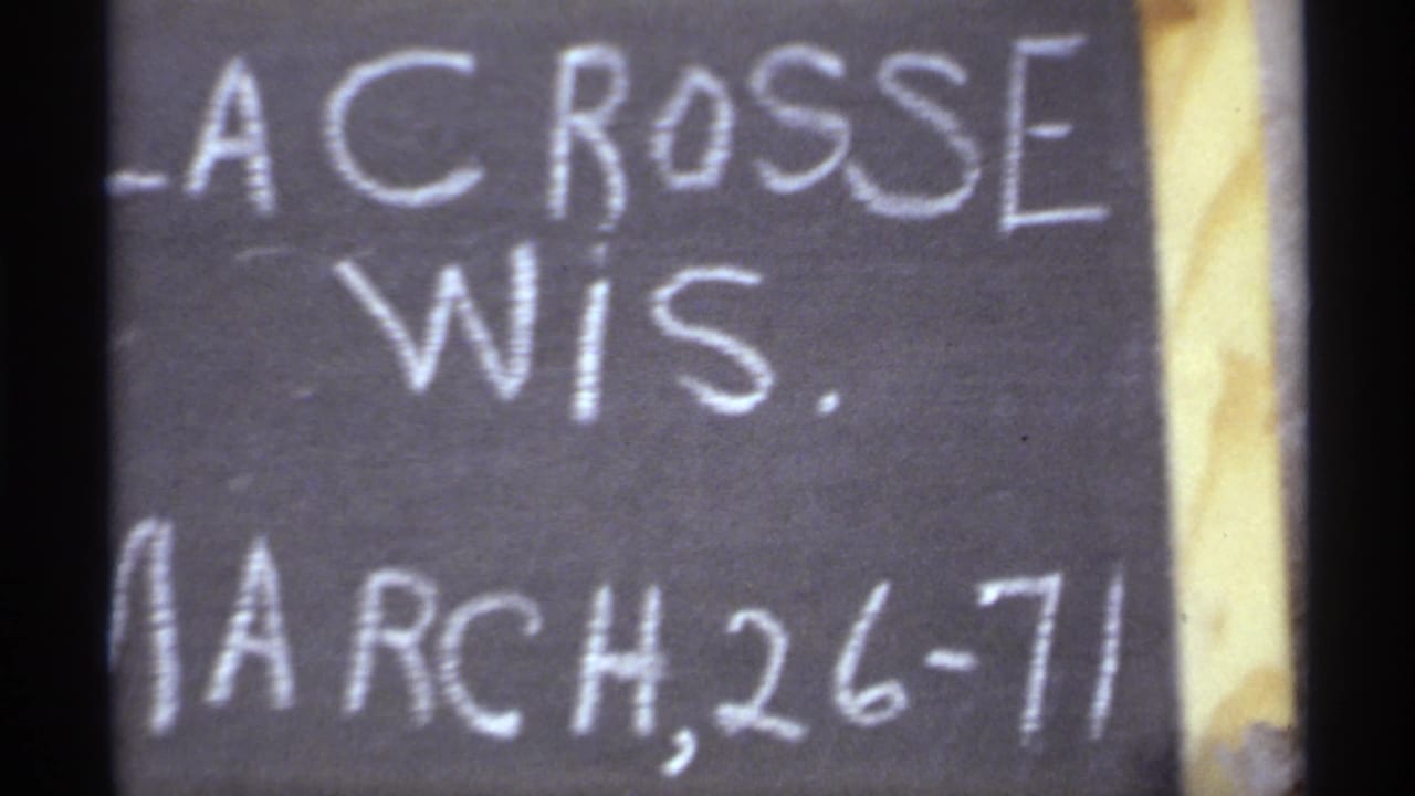 1971 home-movie title card for La Crosse, Wisconsin, with handwritten chalk text naming the location and date.