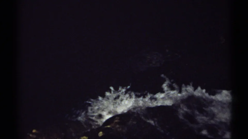 The final frame turns toward the waterfall itself, showing white foaming water in a dark rocky channel with little human detail visible.